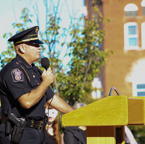 Police Officer speaking to crowd